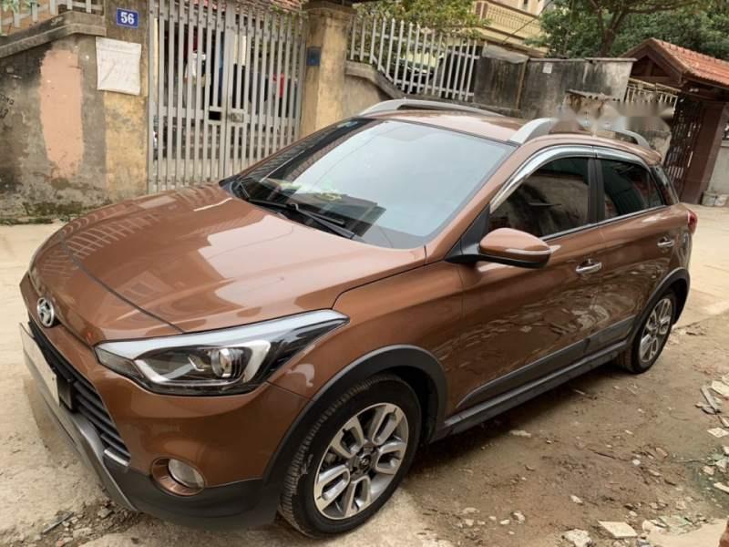 Hyundai i20 Active 2015 - Cần bán lại xe Hyundai i20 Active sản xuất năm 2015, màu nâu, nhập khẩu chính chủ, 550tr