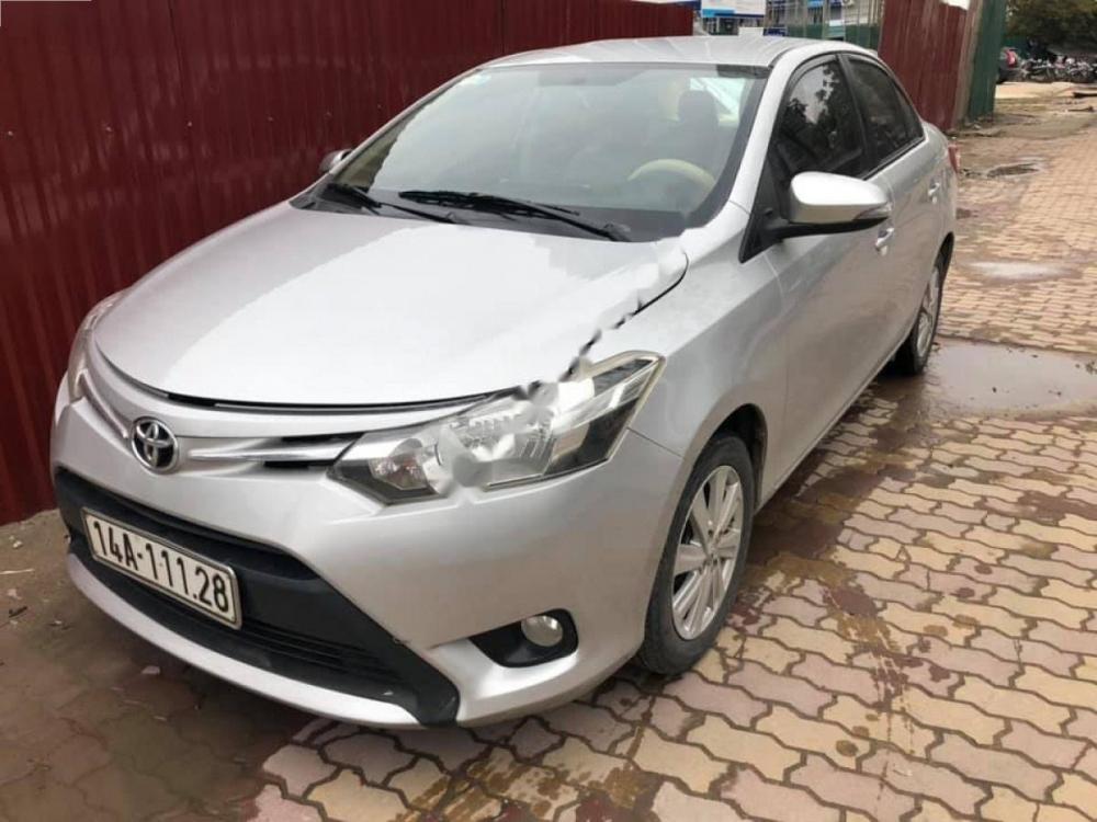 Toyota Vios 1.5E 2014 - Bán Toyota Vios 1.5E đời 2014, màu bạc như mới