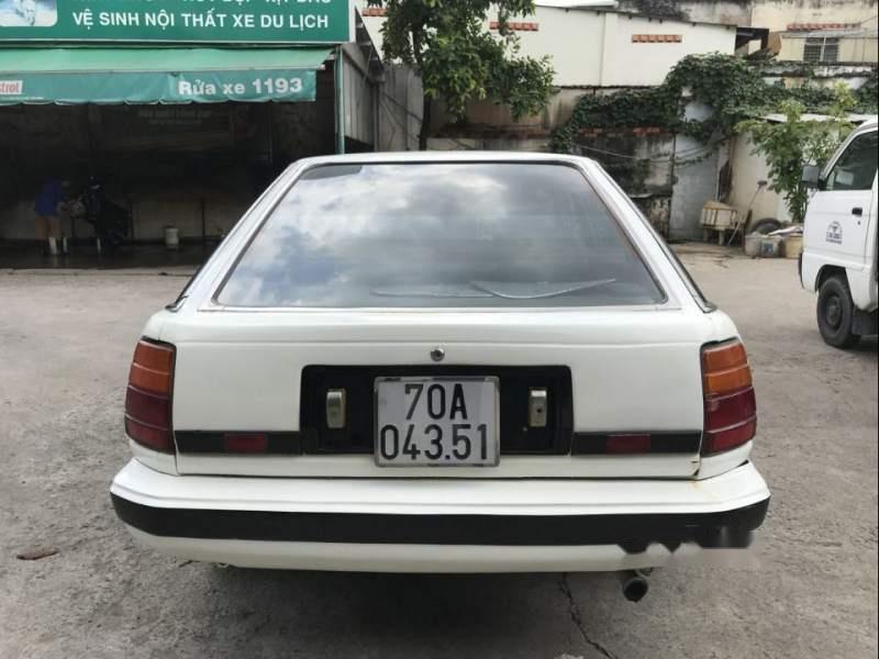 Toyota Corona 1984 - Bán xe Toyota Corona sản xuất năm 1984, màu trắng, nhập khẩu nguyên chiếc, giá 45tr