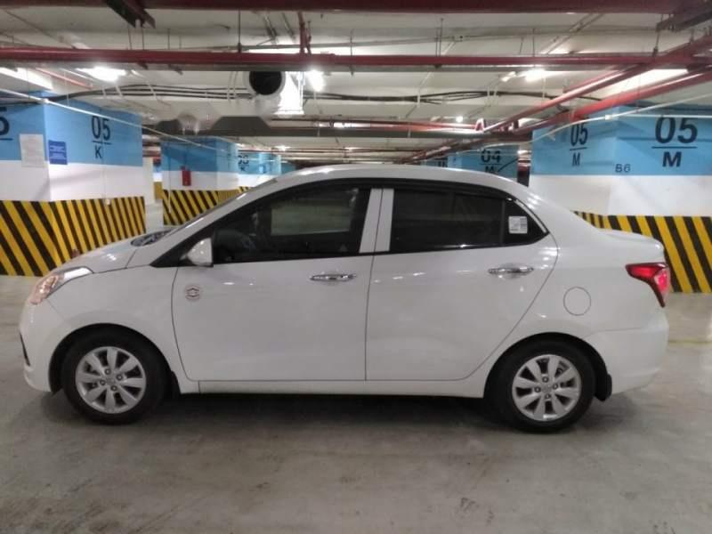 Hyundai Grand i10 AT 2016 - Bán xe Hyundai Grand i10 AT sản xuất năm 2016, màu trắng, xe nhập  