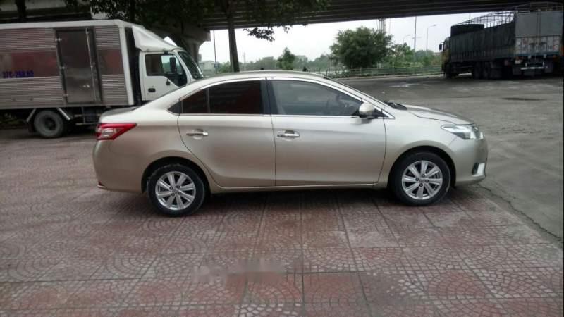 Toyota Vios E 2014 - Bán xe Toyota Vios E năm sản xuất 2014, màu vàng cát