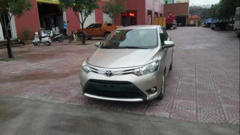 Toyota Vios E 2014 - Bán xe Toyota Vios E năm sản xuất 2014, màu vàng cát