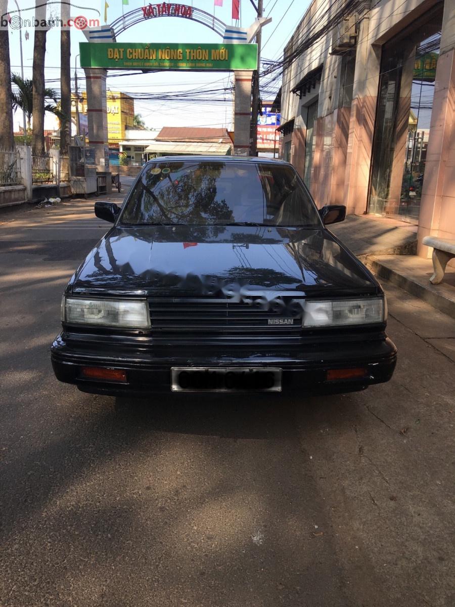 Nissan Maxima 3.0 MT   1987 - Cần bán xe Nissan Maxima 3.0 MT năm 1987, màu đen, số tay, máy xăng, màu đen, đã đi 110000 km