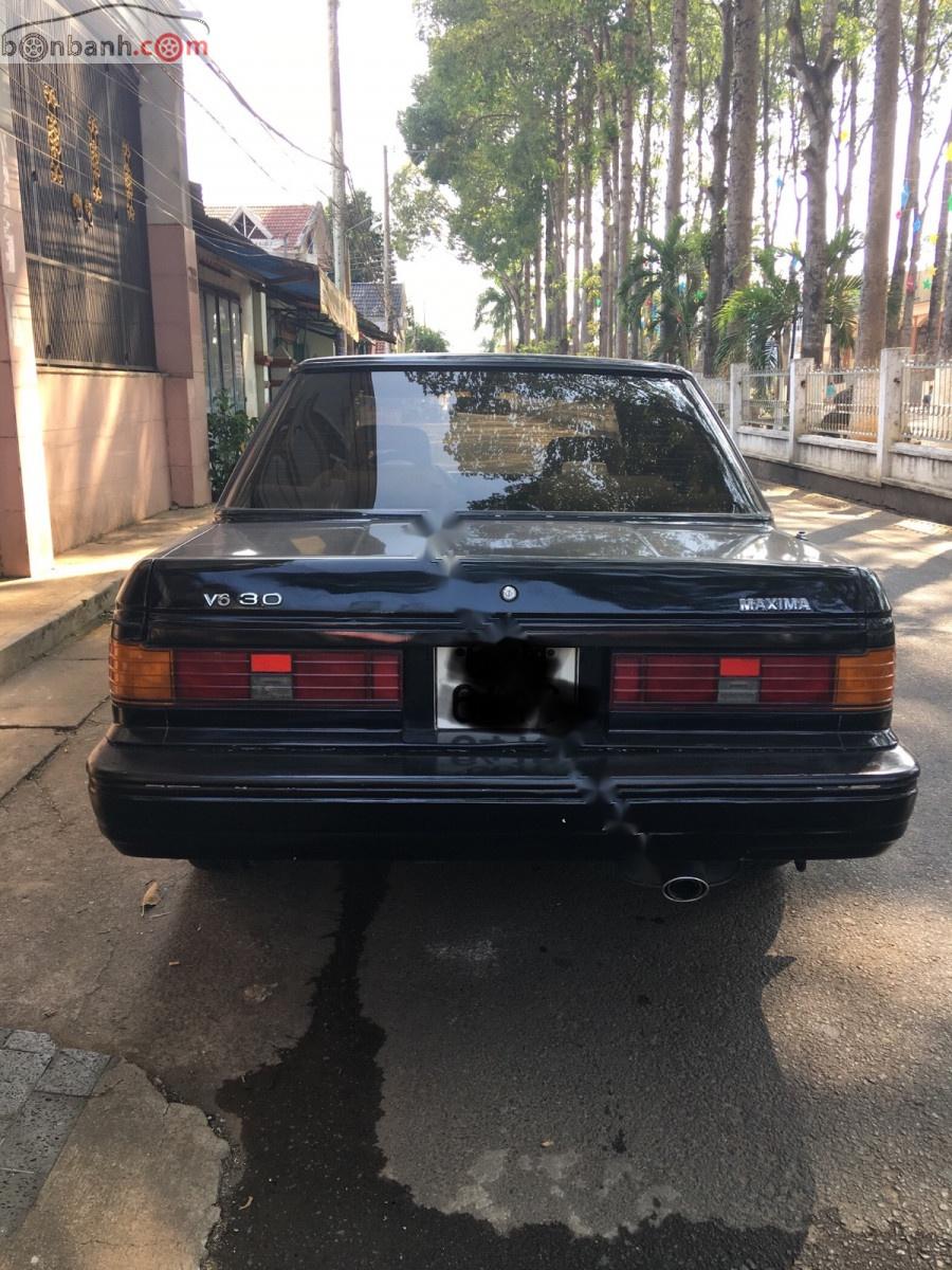 Nissan Maxima 3.0 MT   1987 - Cần bán xe Nissan Maxima 3.0 MT năm 1987, màu đen, số tay, máy xăng, màu đen, đã đi 110000 km