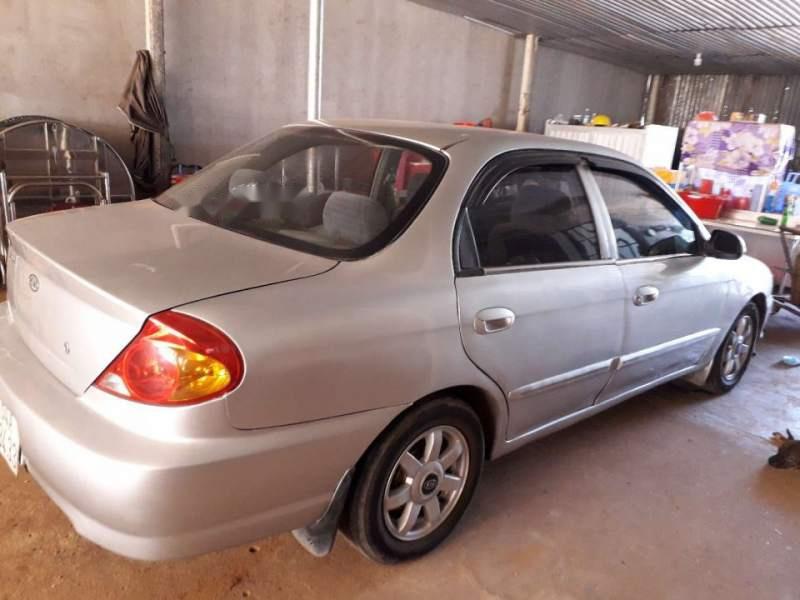 Kia Spectra MT 2004 - Cần bán gấp Kia Spectra MT đời 2004, màu bạc, nhanh tay liên hệ