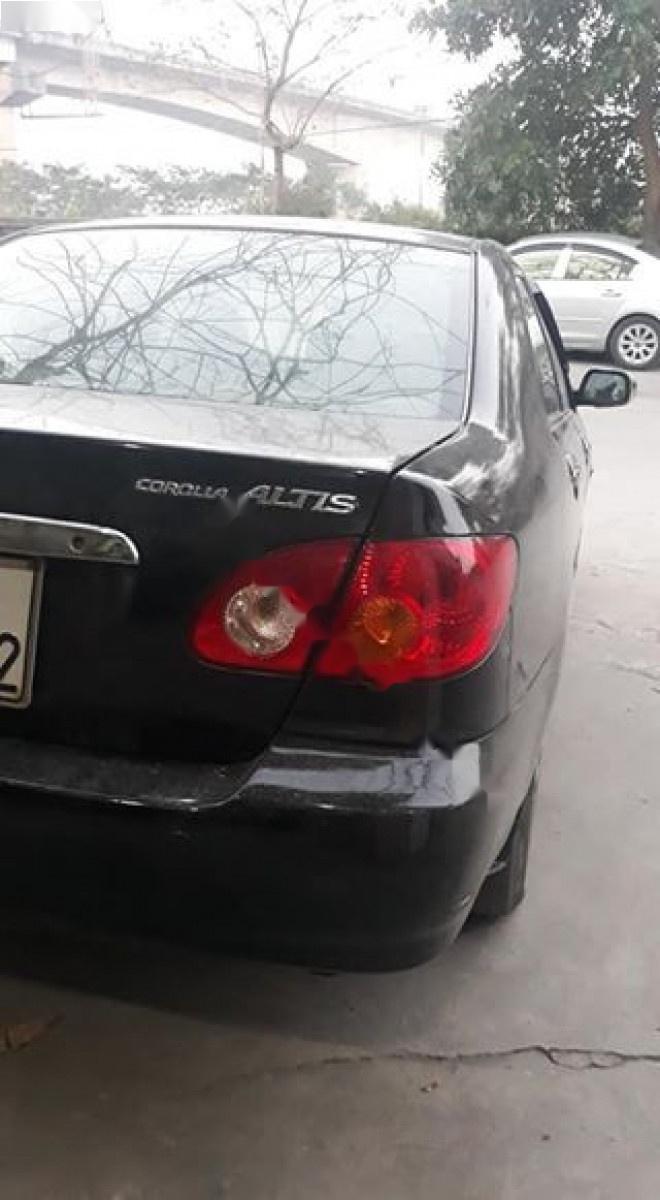 Toyota Corolla altis 1.8G MT 2003 - Bán Toyota Corolla altis 1.8G MT năm sản xuất 2003, màu đen 