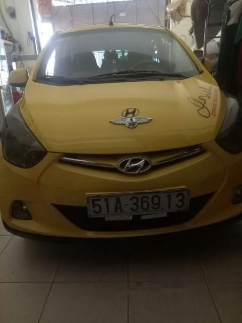 Hyundai Eon   2012 - Bán ô tô Hyundai Eon sản xuất năm 2012, màu vàng, xe nhập