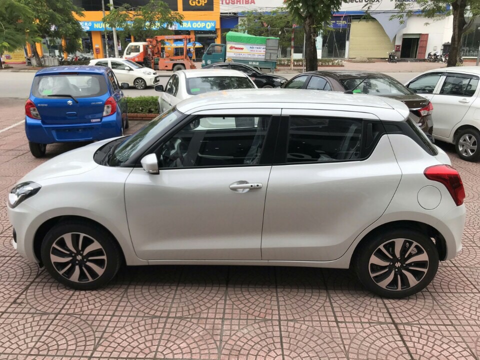 Suzuki Swift GLX 2019 - Bán Suzuki Swift GLX màu trắng, mới 100%, xe nhập khẩu, giá tốt, liên hệ 0911.935.188