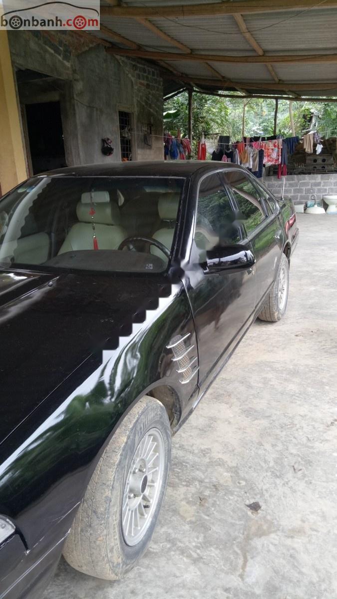 Nissan Cefiro 2.0 MT 1992 - Bán Nissan Cefiro 2.0 MT năm 1992, màu đen, xe nhập