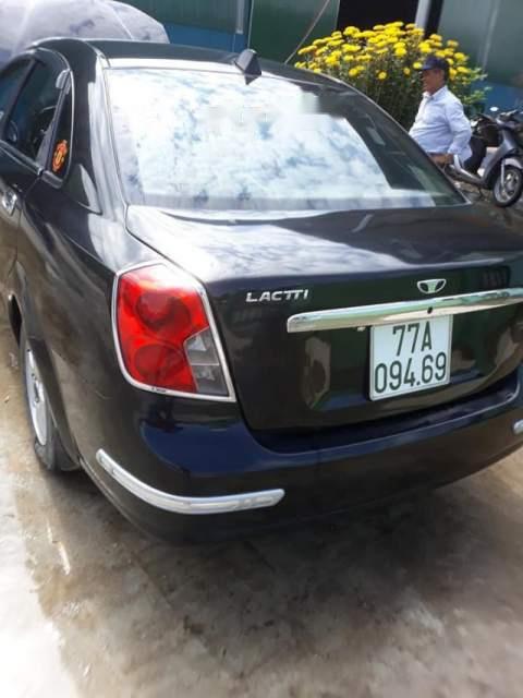 Daewoo Lacetti 2004 - Cần bán gấp Daewoo Lacetti sản xuất năm 2004, màu đen giá cạnh tranh