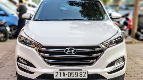 Hyundai Tucson  2.0 AT  2018 - Cần bán lại xe Hyundai Tucson 2.0 AT sản xuất năm 2018, màu trắng, mới chạy 4 tháng, odo mới chạy 8000km