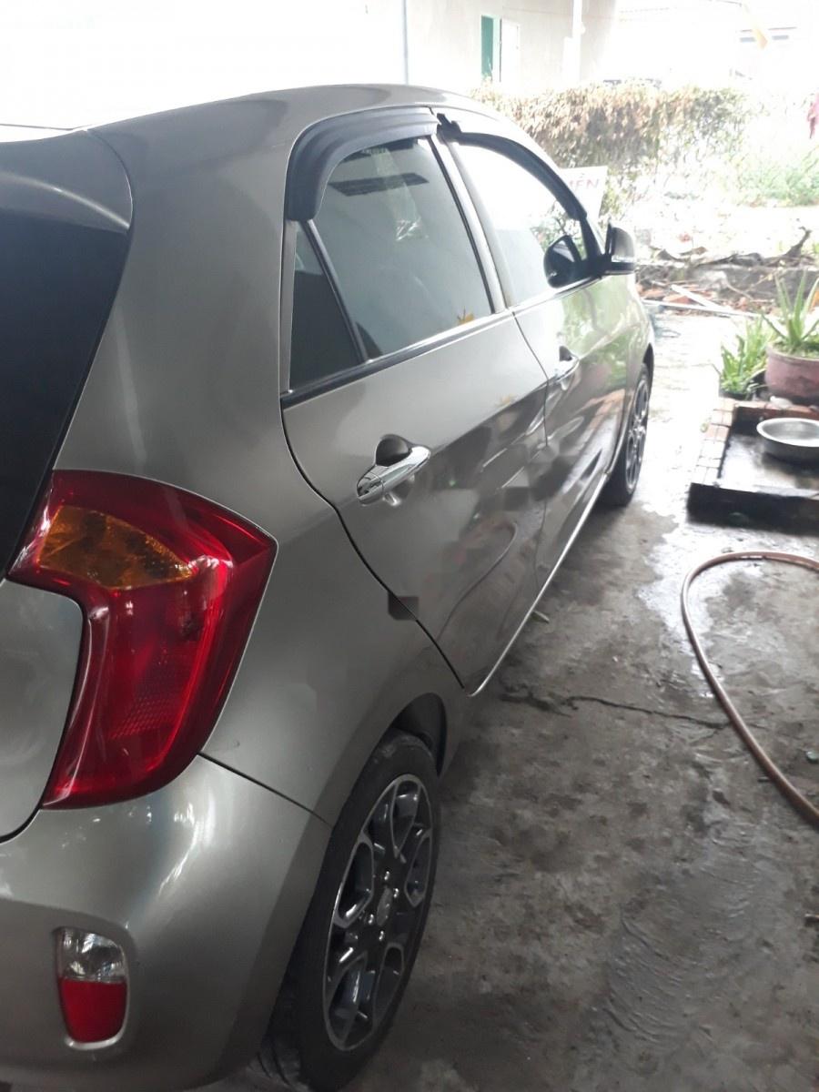 Kia Picanto S 1.25 AT 2014 - Bán Kia Picanto S 1.25 AT đời 2014, màu vàng, giá 318tr