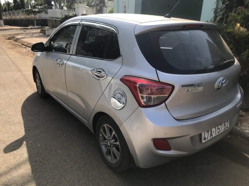 Hyundai Grand i10   2014 - Bán Hyundai Grand i10 sản xuất năm 2014, màu bạc, xe nhập