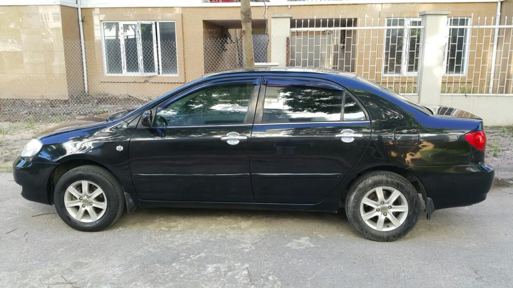 Toyota Corolla altis G 2004 - Cần bán Toyota Corolla altis G 2004, màu đen, giá 290tr