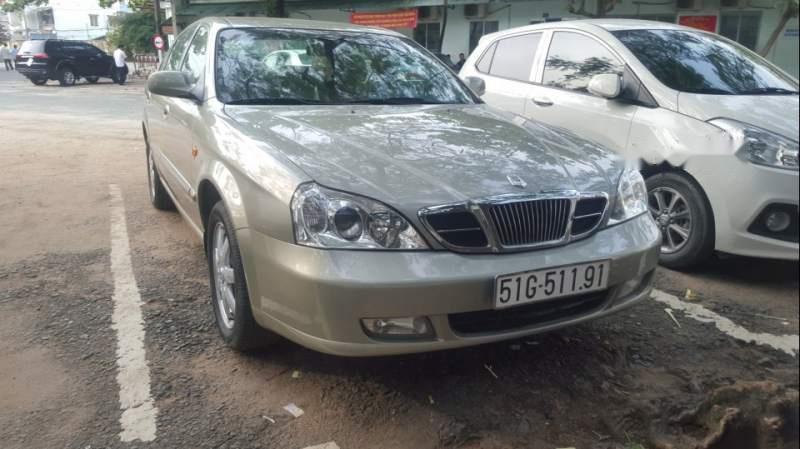 Daewoo Magnus 2004 - Cần bán gấp Daewoo Magnus đời 2004, màu bạc, nhập khẩu