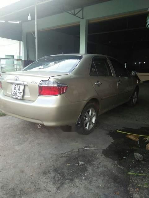 Toyota Vios G 2004 - Cần bán Toyota Vios G sản xuất năm 2004, màu ghi vàng  