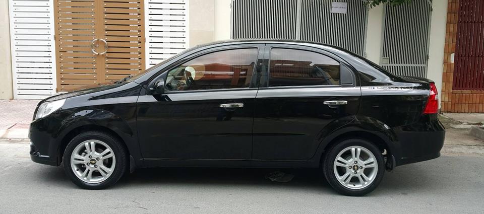Chevrolet Aveo LTZ 2015 - Cần tiền bán gấp Chevrolet Aveo 2015 số tự động màu đen