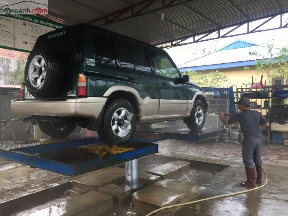 Suzuki Vitara JLX 2005 - Bán Suzuki Vitara JLX sx 2005, số tay, máy xăng, màu xanh, nội thất màu kem