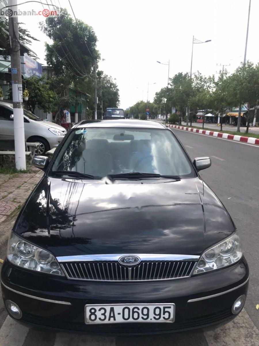 Ford Laser 1.8MT 2003 - Cần bán xe Ford Laser 2003 số tay 1.8, xe chạy rất ít hao xăng