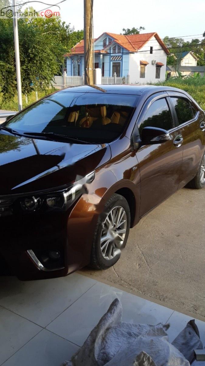 Toyota Corolla altis 1.8G MT 2015 - Bán Toyota Corolla altis 1.8G MT đời 2015, màu nâu, đẹp như mới