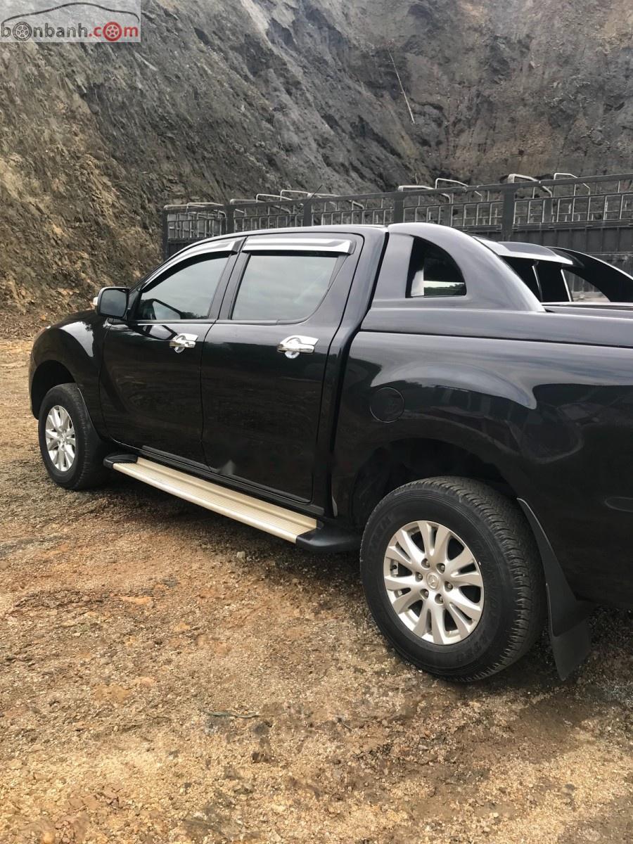 Mazda BT 50 3.2L 4x4 AT 2014 - Gia đình bán xe Mazda BT 50 3.2L 4x4 AT đời 2014, màu đen, nhập khẩu