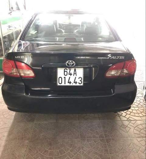 Toyota Corolla altis 2004 - Bán Toyota Corolla altis sản xuất 2004, màu đen xe gia đình
