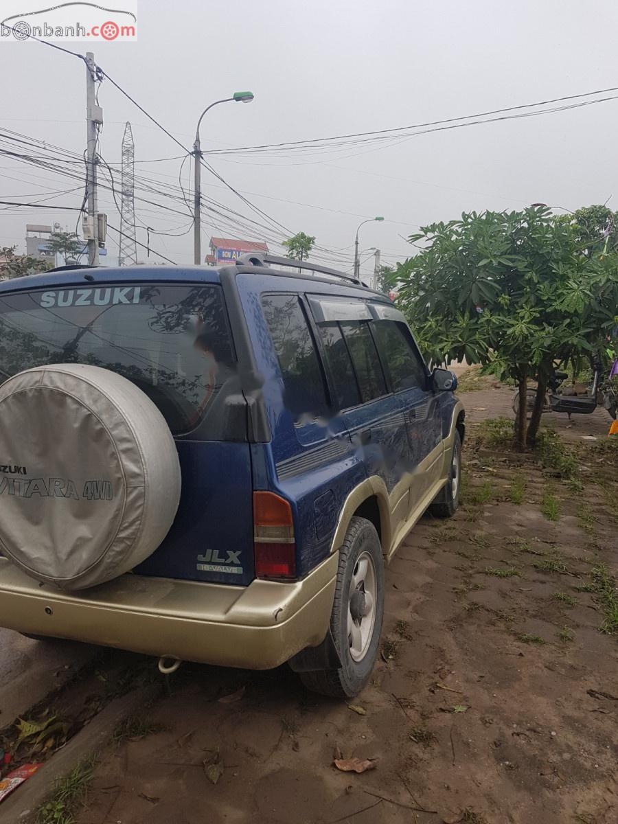 Suzuki Vitara 2003 - Chính chủ bán Suzuki Vitara năm 2003, màu xanh lam, xe nhập
