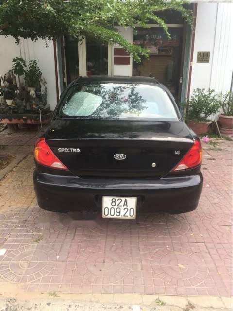 Kia Spectra 2006 - Cần bán xe Kia Spectra đời 2006, màu đen, xe nhập