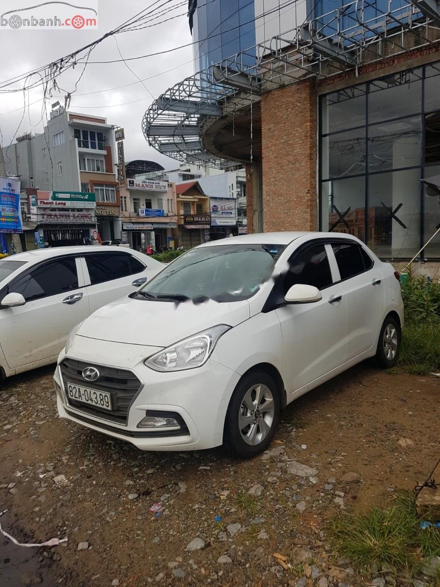 Hyundai Grand i10   1.2 MT 2018 - Bán ô tô Hyundai Grand i10 1.2 MT sản xuất 2018, màu trắng, mua tháng 4/2018