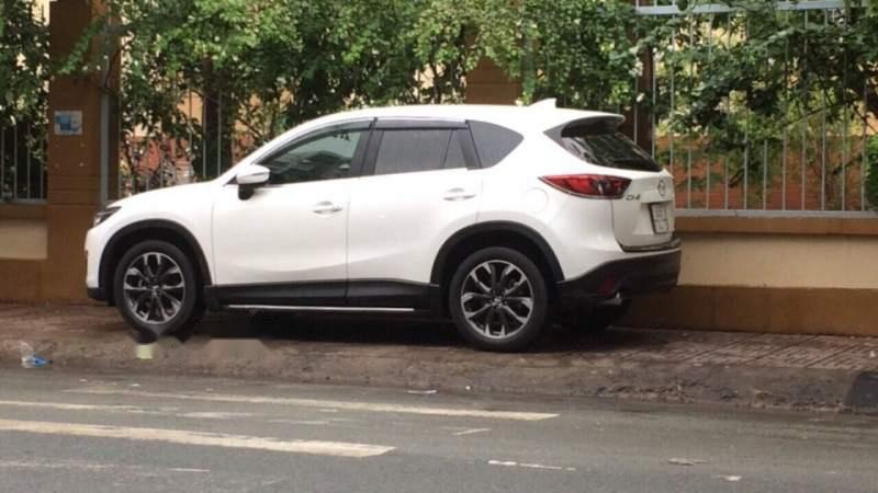 Mazda CX 5 2WD 2016 - Bán xe Mazda CX 5 2WD đời 2016, màu trắng xe gia đình, 845tr