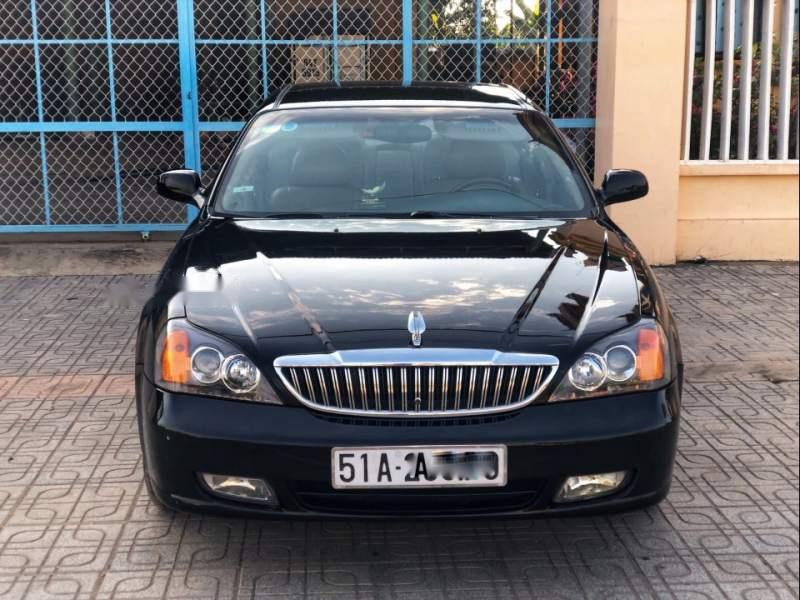 Daewoo Magnus 2005 - Bán xe Daewoo Magnus sản xuất năm 2005, màu đen xe gia đình