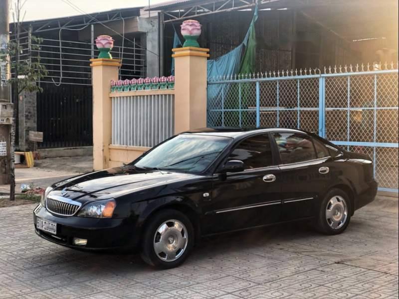 Daewoo Magnus 2005 - Bán xe Daewoo Magnus sản xuất năm 2005, màu đen xe gia đình