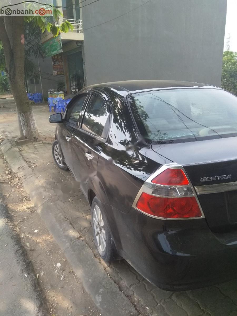 Daewoo Gentra Sx 2009 - Cần bán gấp Daewoo Gentra Sx 2009, màu đen 