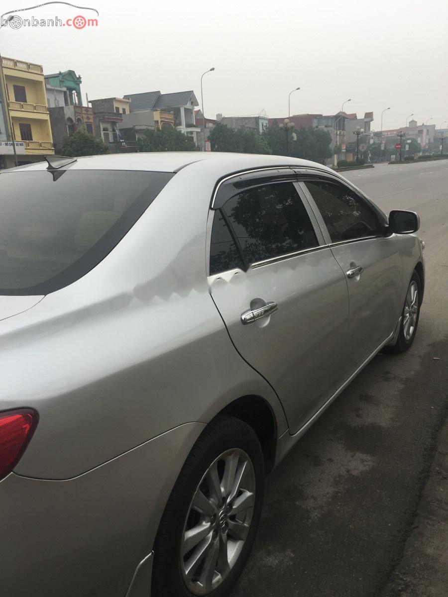 Toyota Corolla 2007 - Bán Toyota Corolla sản xuất 2007, màu bạc, xe nhập như mới 