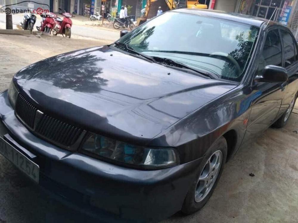 Mitsubishi Lancer 2003 - Gia đình bán chiếc Lancer 2003 số sàn