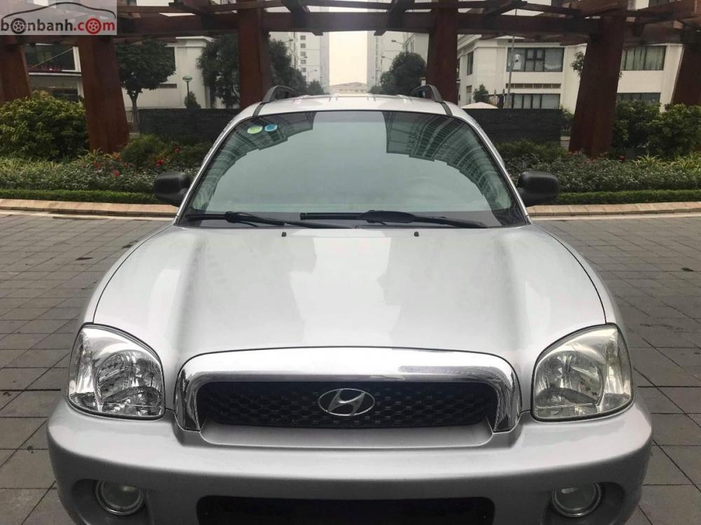 Hyundai Santa Fe Gold AT 2005 - Bán Hyundai Santa Fe Gold màu ghi bạc, 7 chỗ, số tự động, full options, ghế điện máy dầu