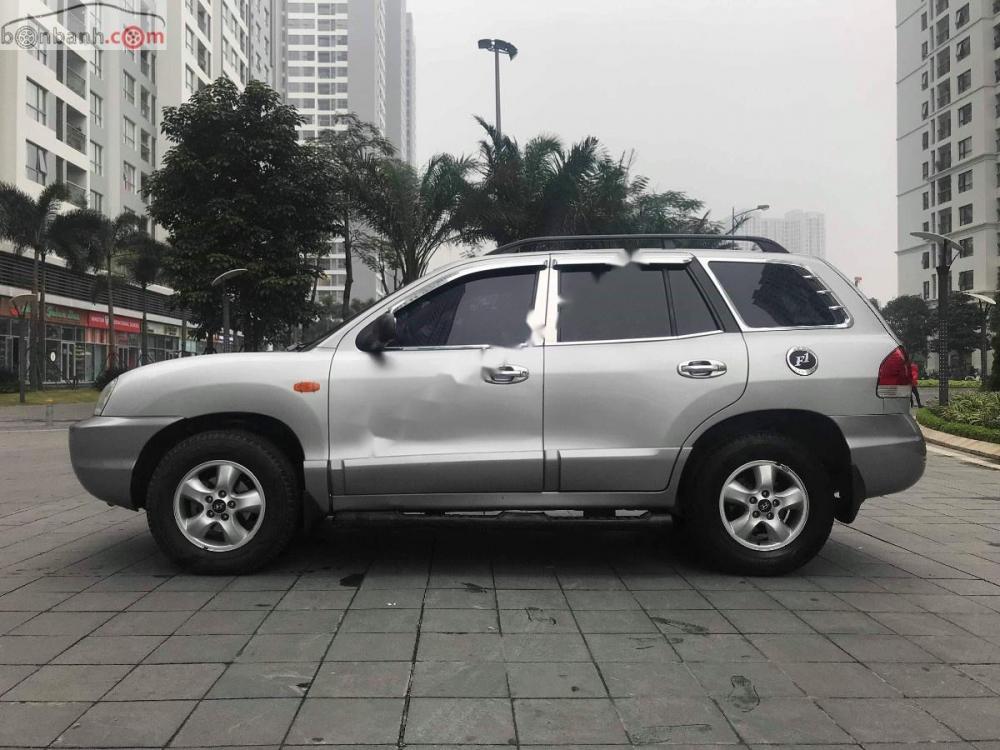 Hyundai Santa Fe Gold AT 2005 - Bán Hyundai Santa Fe Gold màu ghi bạc, 7 chỗ, số tự động, full options, ghế điện máy dầu