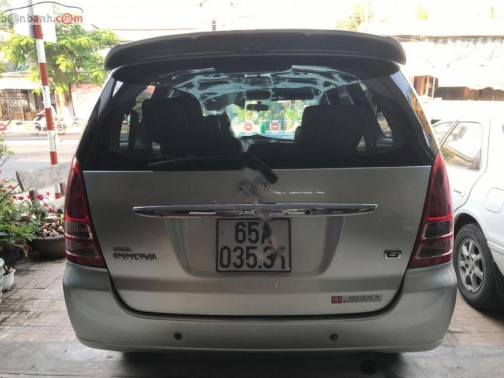 Toyota Innova G 2006 - Gia đình cần bán xe Innova 2006 dòng G, số tay, máy xăng, màu bạc, nội thất màu đen