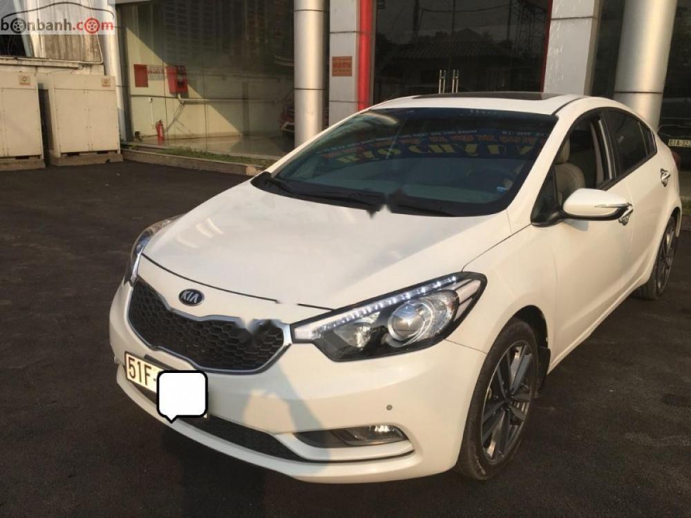 Kia K3 2.0 AT 2016 - Cần bán Kia K3 2.0AT 2016, xe 5 chỗ, bản full số tự động, lắp ráp trong nước, màu trắng, đăng ký biển SG