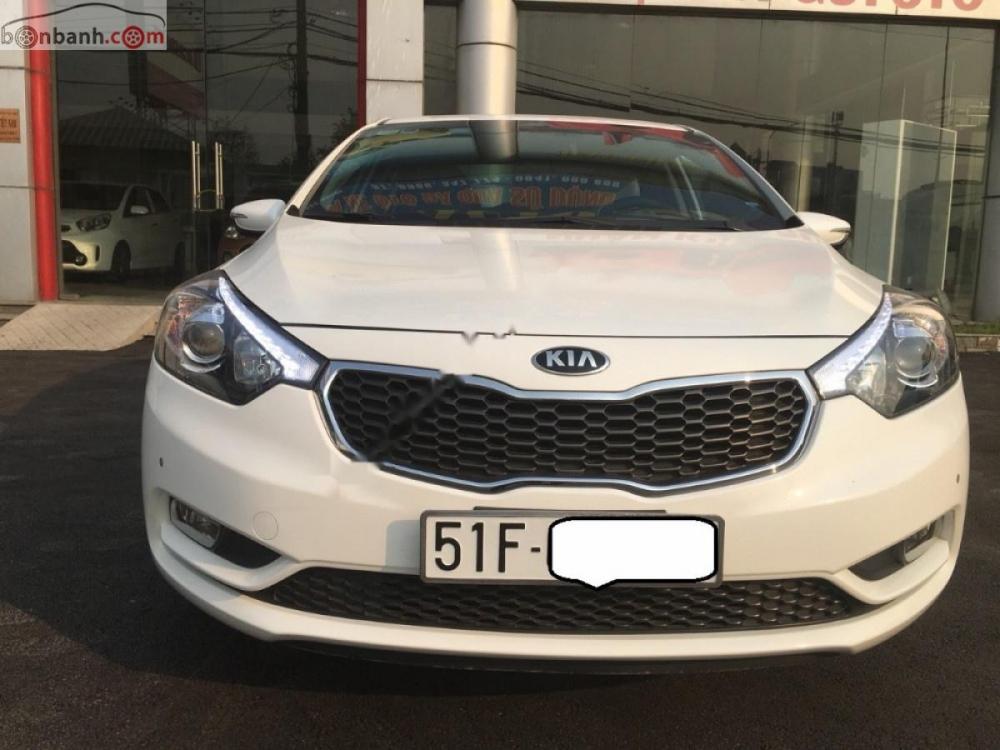 Kia K3 2.0 AT 2016 - Cần bán Kia K3 2.0AT 2016, xe 5 chỗ, bản full số tự động, lắp ráp trong nước, màu trắng, đăng ký biển SG