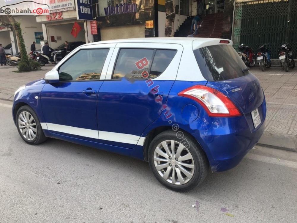 Suzuki Swift 1.4 AT 2014 - Cần bán lại xe Suzuki Swift 1.4 AT 2014, màu xanh lam chính chủ