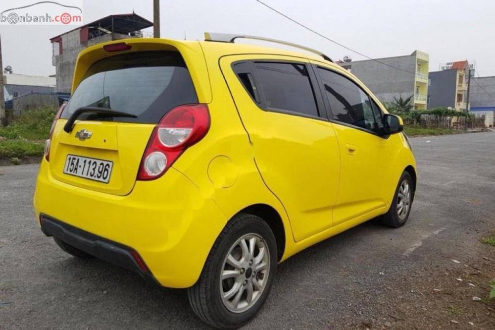 Chevrolet Spark LT 1.0 MT 2013 - Bán Chevrolet Spark LT 1.0 MT năm sản xuất 2013, màu vàng, giá tốt