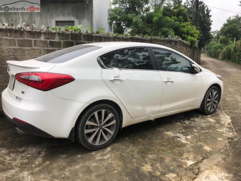 Kia K3 2.0 AT 2016 - Bán ô tô Kia K3 2.0 AT 2016, màu trắng số tự động, giá 558tr