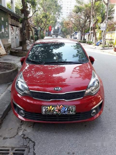 Kia Rio 1.4 AT 2015 - Cần bán lại xe Kia Rio 1.4 AT sản xuất 2015, màu đỏ, xe nhập số tự động