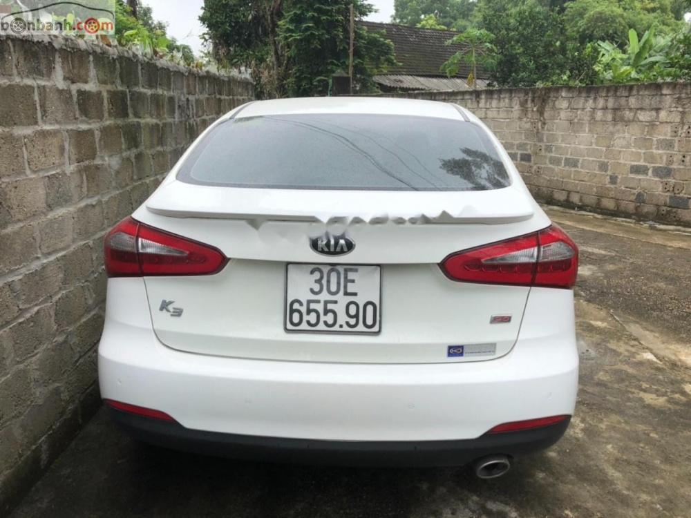 Kia K3 2.0 AT 2016 - Bán ô tô Kia K3 2.0 AT 2016, màu trắng số tự động, giá 558tr