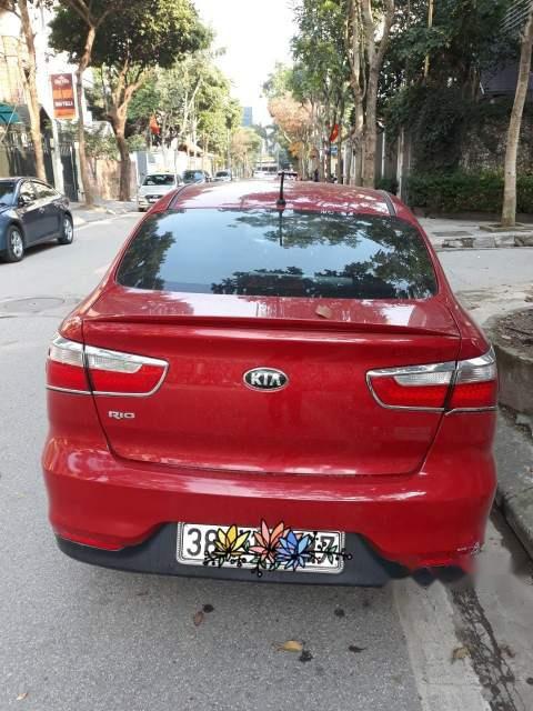 Kia Rio 1.4 AT 2015 - Cần bán lại xe Kia Rio 1.4 AT sản xuất 2015, màu đỏ, xe nhập số tự động