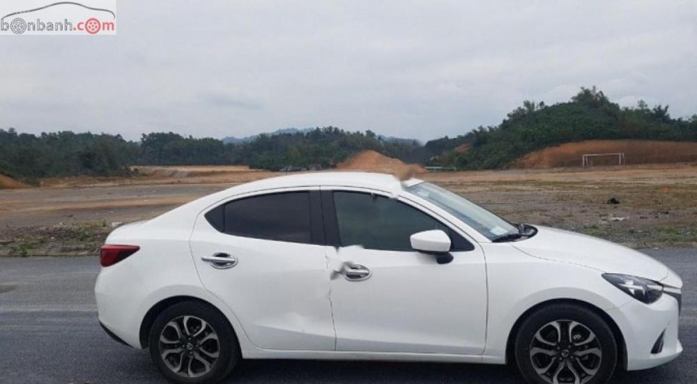 Mazda 2 1.5 AT 2016 - Bán Mazda 2 1.5 AT sản xuất năm 2016, màu trắng chính chủ, giá chỉ 450 triệu