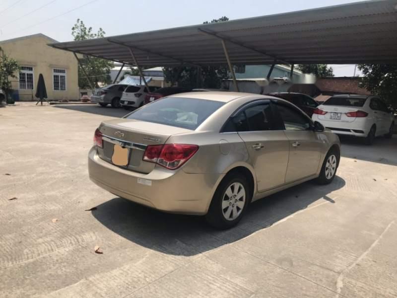 Chevrolet Cruze  LS  2011 - Bán Chevrolet Cruze LS 2011, màu vàng chính chủ