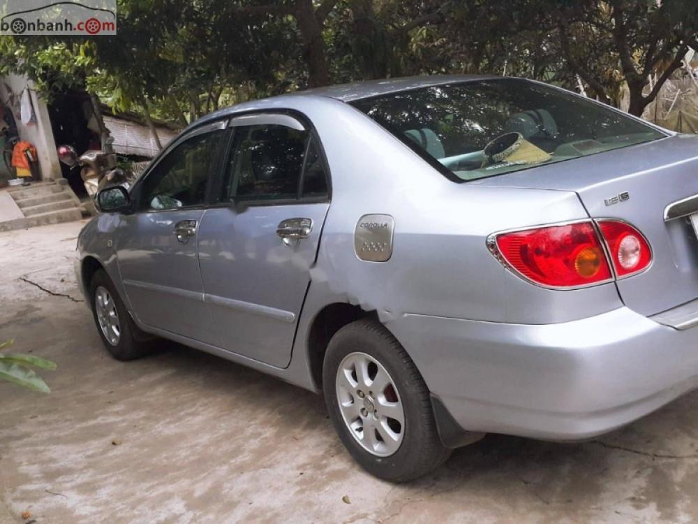 Toyota Corolla altis 1.8G MT 2003 - Bán Toyota Corolla altis 1.8G MT 2003, màu bạc, giá 260tr