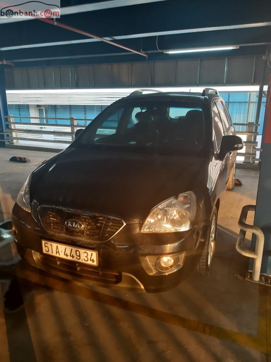 Kia Carens SXMT 2012 - Bán Kia Carens SXMT đời 2012, màu đen, đã đi 65000 km